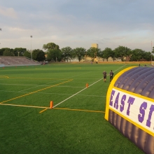 The tunnel even gets a test run as East High School Football returns to Breese Stevens Field, absent since 1975, with a scrimmage on August 8, 2015.