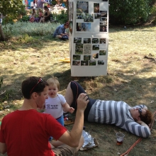 A family relaxes in Willy Street Park.