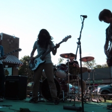Members of Take The King, a hard rock band made up of area high schoolers are the final act at the Kids Stage at the Willy Street Fair, September 14, 2014.