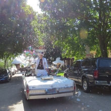 The Bubble Mobile creates a late summer snow storm of bubbles during the Willy Street Fair Parade, September 14, 2014.