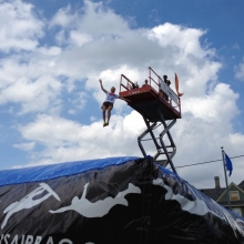 FruitFest attendees could jump from a scissor lift onto a huge airbag, inflated in the Struck & Irwin Fence parking lot.