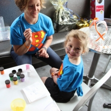 Blake's aunt Stacy Laufenberg Schmidt painted faces for the cause. She was quite busy. Photo  by: Brett Williams