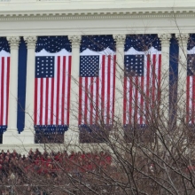 Massive flags cover the Capitol archways at the second Inauguration of President Barack Obama - January 21, 2013.