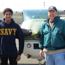 Madison East High Senior Charles Lombardo before his flight with EAA Young Eagle Pilot Bob Gilreath. Lombardo will be entering the Navy in June and took Aviation classes at East High School.