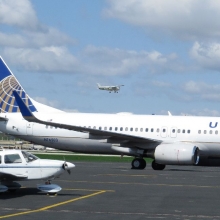 A United Airlines U.S. Military charter prepares to leave the Wisconsin Aviation ramp at the Dane County Regional Airport.