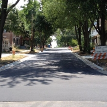 500 block of S. Ingersoll gets new ‘phalt after a long and involved “down to the dirt” reconstruction.