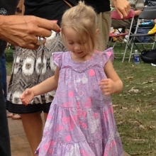 A young girl likes to dance to the blues during the Orton Park Festival on Sunday, August 26, 2012.