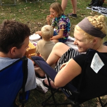 A family picnics and listens to the music during the Orton Park Festival on Sunday, August 26, 2012.