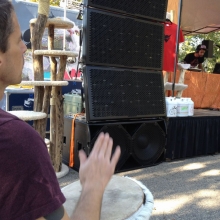 A independent hand drum player beats along to the beats.