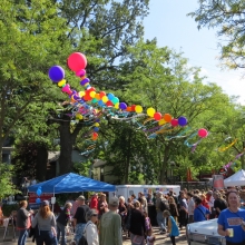 The Willy Street Fair balloon arch painted by the waning summer sun at the Willy Street Fair, September 14, 2014.
